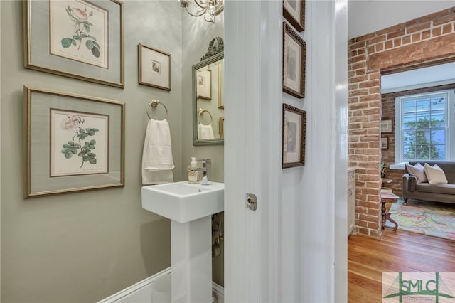 bathroom featuring wood-type flooring