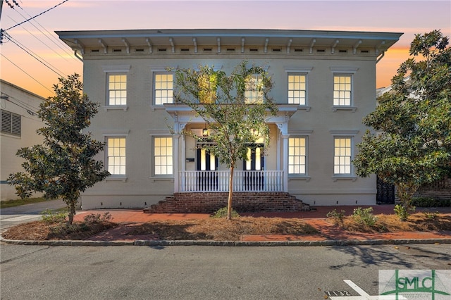 italianate house with a porch