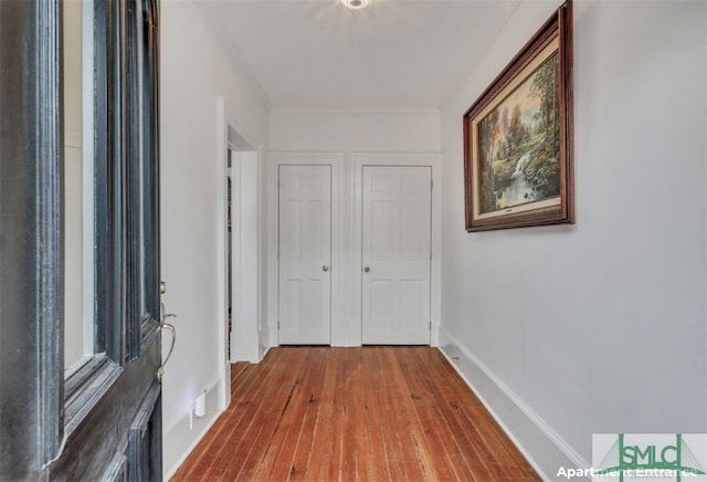 hall featuring hardwood / wood-style flooring