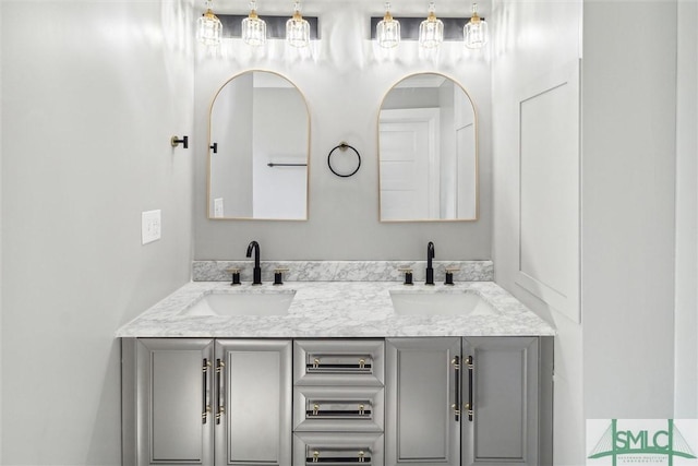 bathroom with double vanity and a sink