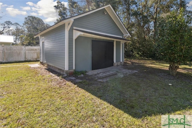 garage featuring fence