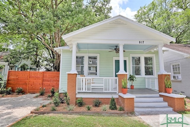 view of front of property with cooling unit, covered porch, and ceiling fan