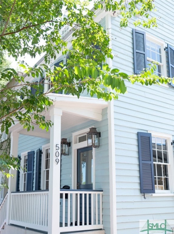 view of home's exterior with a porch