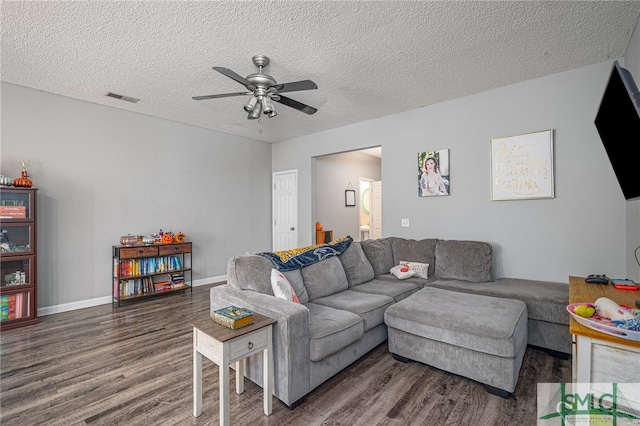1030 Canyon Oak Loop, Richmond Hill, GA 31324 - living area featuring wood finished floors, ceiling fan, a textured ceiling, and baseboards