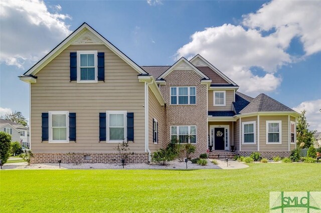 view of front of home featuring a front lawn