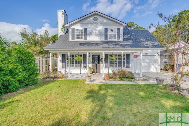 view of front of house with a porch, a front lawn, and a garage