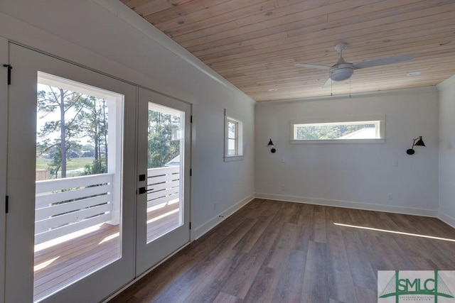 doorway with wooden ceiling, dark wood-type flooring, ceiling fan, and a healthy amount of sunlight