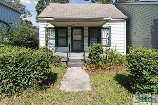 entrance to property with covered porch