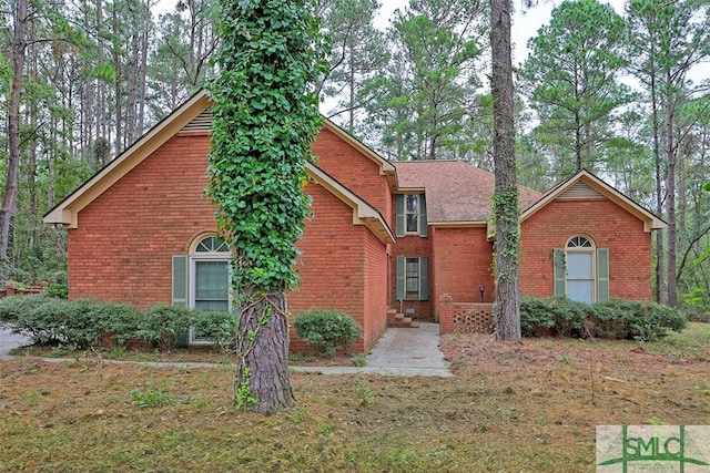 view of property with a front lawn