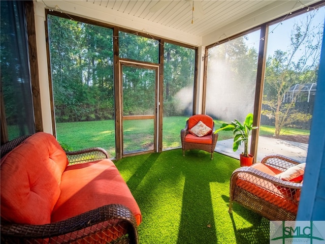 sunroom with wooden ceiling