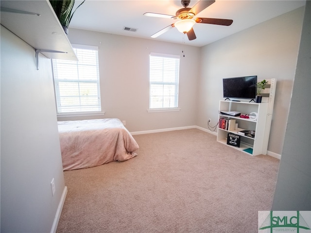 bedroom with carpet floors and ceiling fan