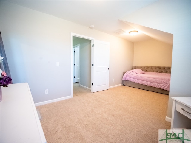 bedroom with light carpet