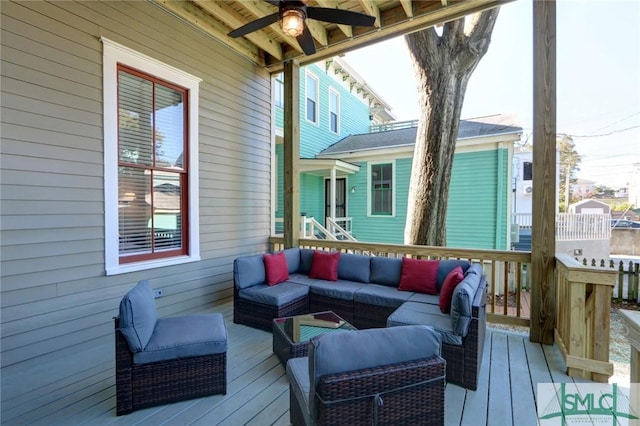 wooden terrace with outdoor lounge area