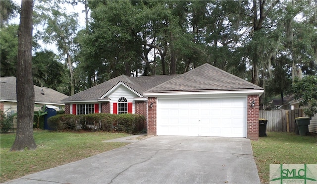 single story home featuring a garage and a front lawn