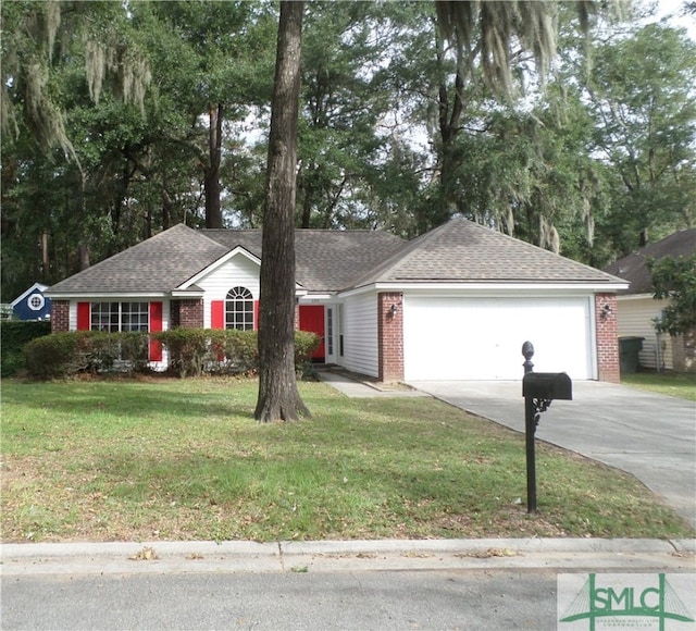 ranch-style house featuring a garage and a front yard