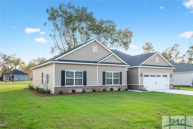 craftsman house with a front yard and a garage