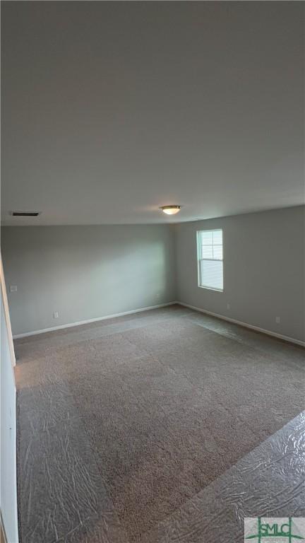 20 Flagler Dr, Savannah, GA 31419 - carpeted empty room with baseboards