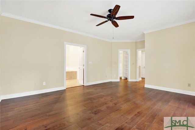 empty room featuring dark hardwood / wood-style floors, ceiling fan, and ornamental molding