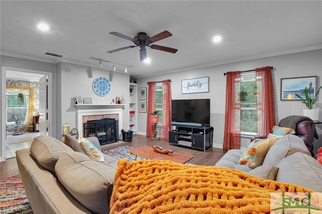 15 Cromwell Pl, Savannah, GA 31410 - living room featuring ceiling fan, wood finished floors, ornamental molding, a fireplace, and recessed lighting
