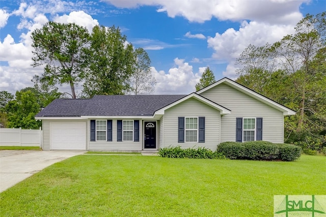 ranch-style home featuring a front yard and a garage