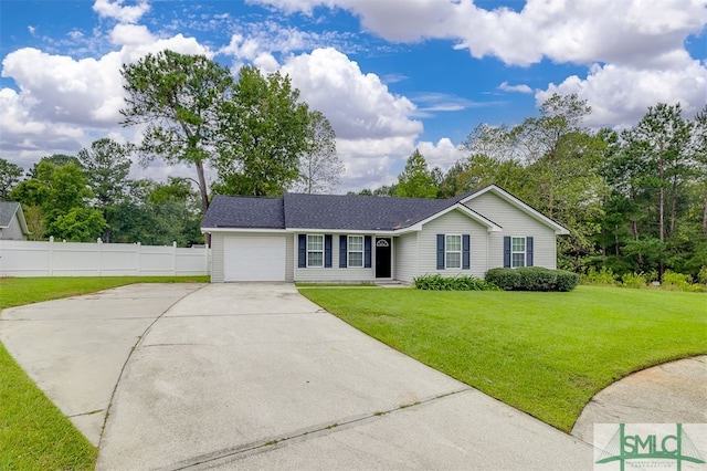 single story home featuring a garage and a front lawn