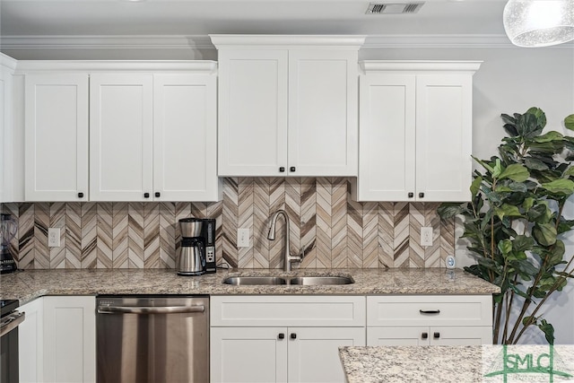 kitchen featuring dishwasher, crown molding, sink, and white cabinetry