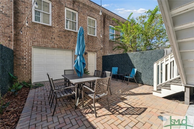 view of patio / terrace with a garage