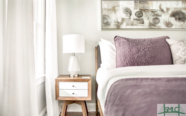 bedroom featuring wood-type flooring