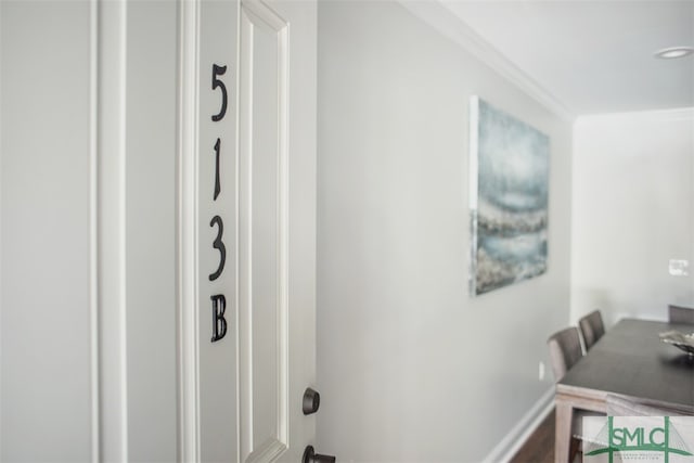 interior space featuring crown molding