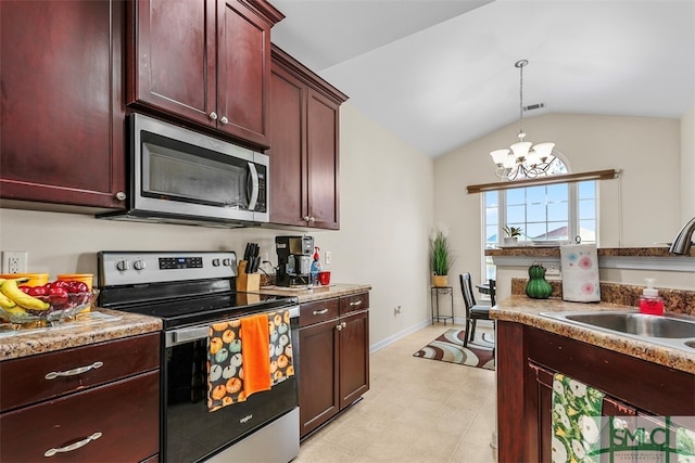 kitchen featuring lofted ceiling, sink, decorative light fixtures, a chandelier, and stainless steel appliances