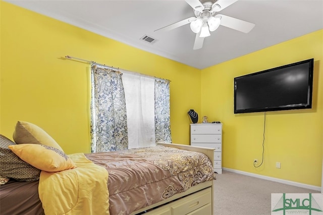 carpeted bedroom with ceiling fan