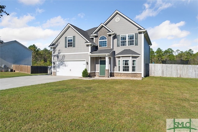 view of front of home featuring a garage and a front lawn