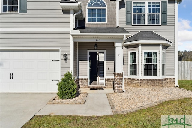 property entrance featuring a garage and a porch