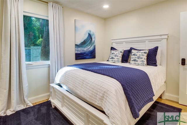 bedroom with light hardwood / wood-style flooring