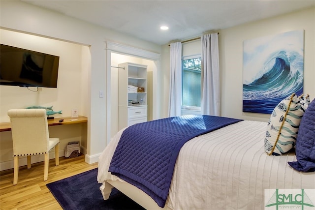 bedroom featuring wood-type flooring