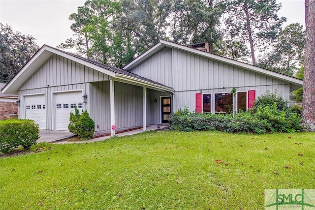 ranch-style house featuring a garage and a front lawn