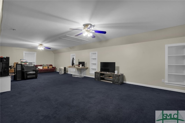 carpeted living room with ceiling fan and built in shelves