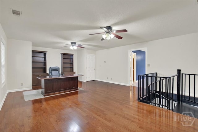 46 River Oaks Rd, Savannah, GA 31410 - living area featuring a desk, a ceiling fan, baseboards, and dark wood-style floors
