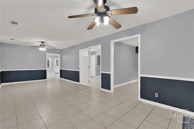 46 River Oaks Rd, Savannah, GA 31410 - spare room featuring a ceiling fan, light tile patterned floors, and baseboards