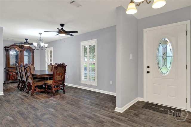 46 River Oaks Rd, Savannah, GA 31410 - dining space featuring ceiling fan, baseboards, dark wood-type flooring, and a chandelier