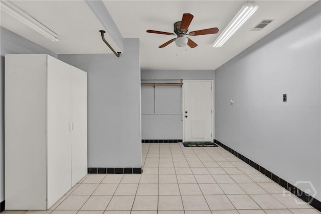 46 River Oaks Rd, Savannah, GA 31410 - unfurnished room with a ceiling fan, baseboards, and light tile patterned flooring