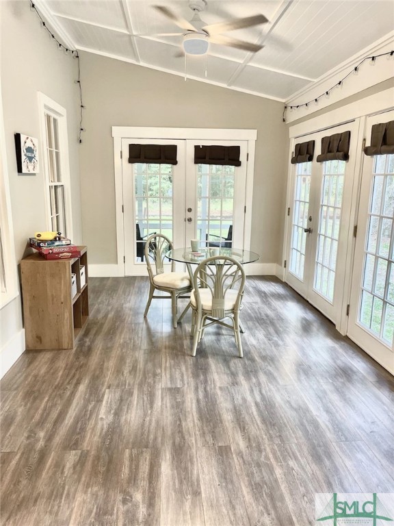 dining area featuring french doors, dark hardwood / wood-style floors, and a healthy amount of sunlight