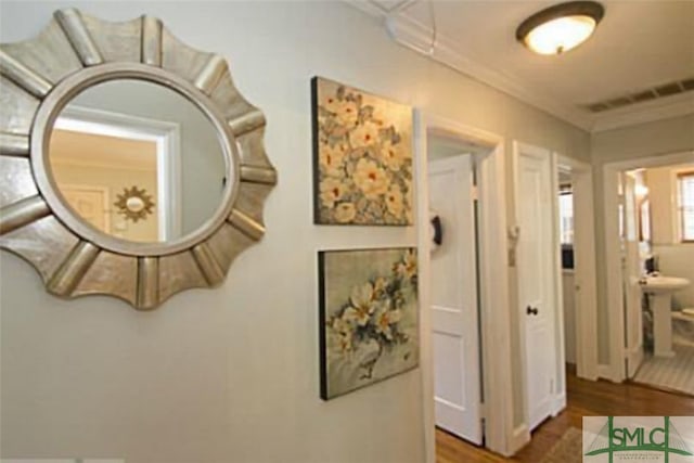 hallway with wood-type flooring