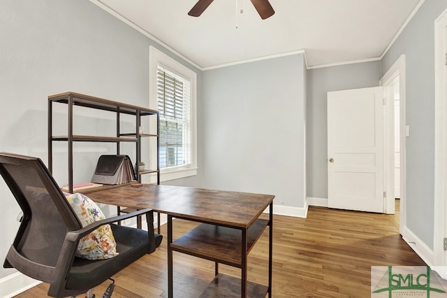 office area with ornamental molding, ceiling fan, and wood-type flooring