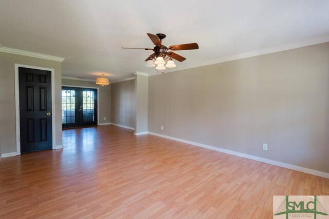 159 E 1st St, Midway, GA 31320 - unfurnished room with light wood-type flooring, ornamental molding, and ceiling fan