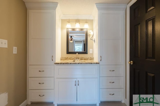 159 E 1st St, Midway, GA 31320 - bathroom with vanity and ornamental molding