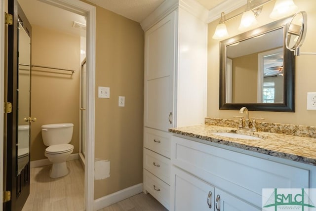159 E 1st St, Midway, GA 31320 - full bathroom featuring vanity, wood finished floors, and a shower