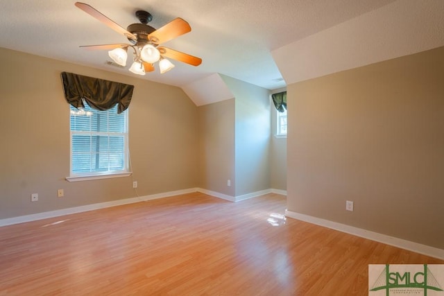 159 E 1st St, Midway, GA 31320 - bonus room with light wood-type flooring, a ceiling fan, and lofted ceiling