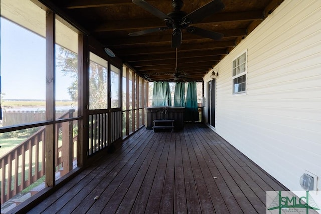 159 E 1st St, Midway, GA 31320 - deck with a ceiling fan and a hot tub