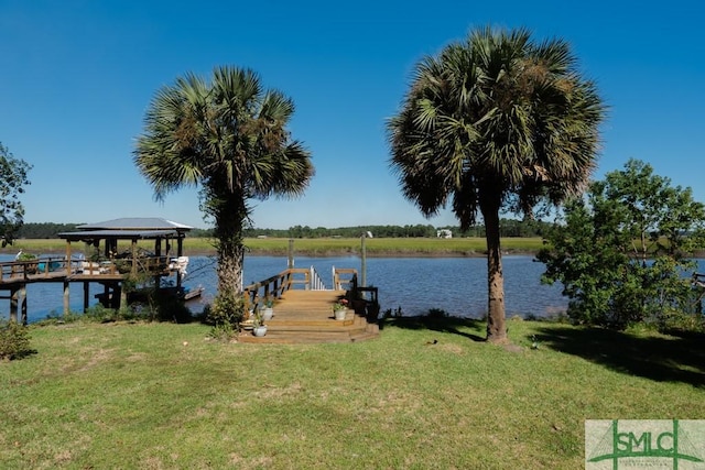 159 E 1st St, Midway, GA 31320 - dock featuring a yard and a water view